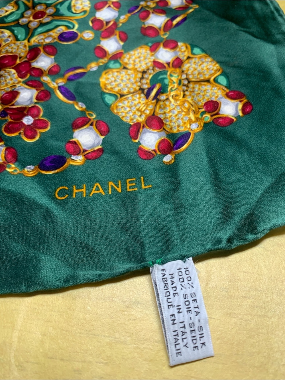 CHANEL Emerald Green Silk Scarf with Jeweled Motif